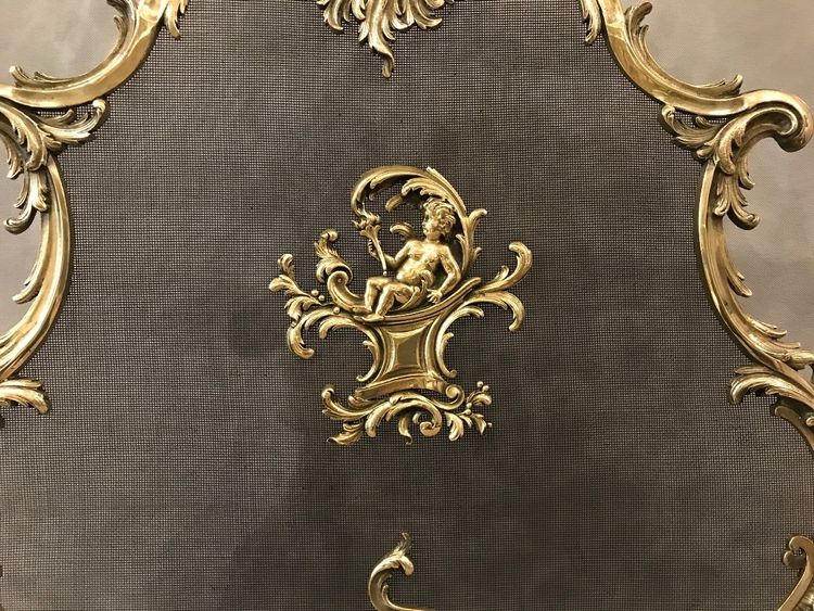 Louis XV style bronze fireplace screen from the 19th century