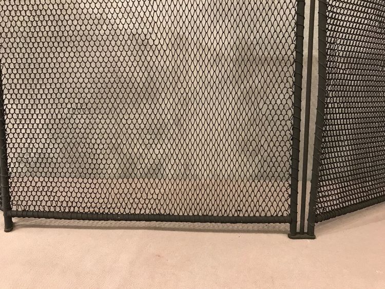 Small old fireplace screen in blackened iron from the 19th century