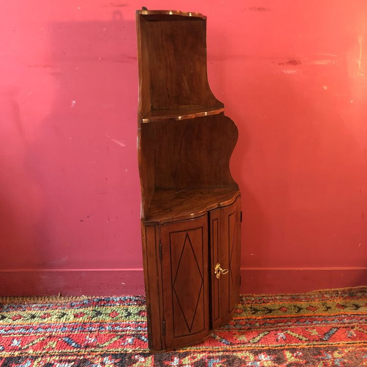 Rare hanging corner cupboard in crossbow shape, Louis XV period