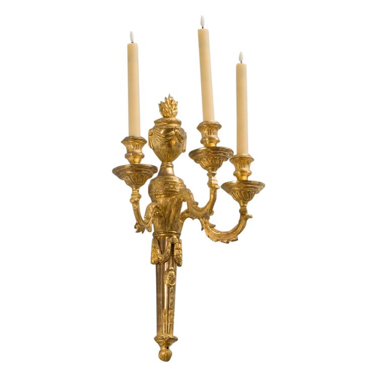 Pair of Louis XVI period gilt and chased bronze wall lights