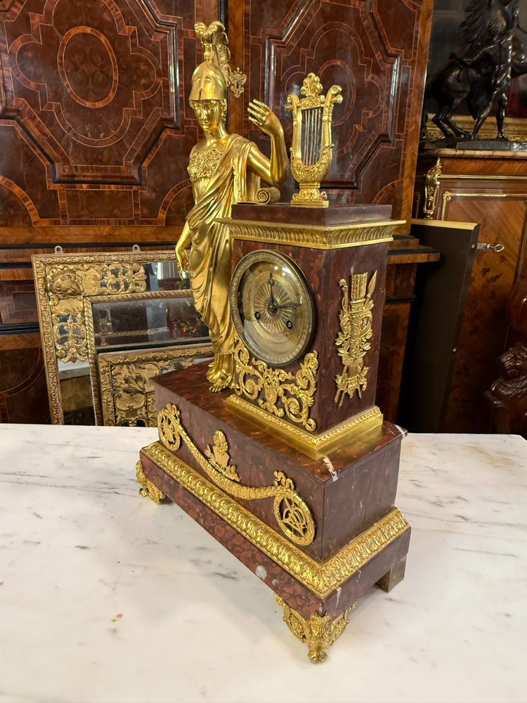 EMPIRE PERIOD CLOCK WITH DECOR OF A HELMETED MINERVA