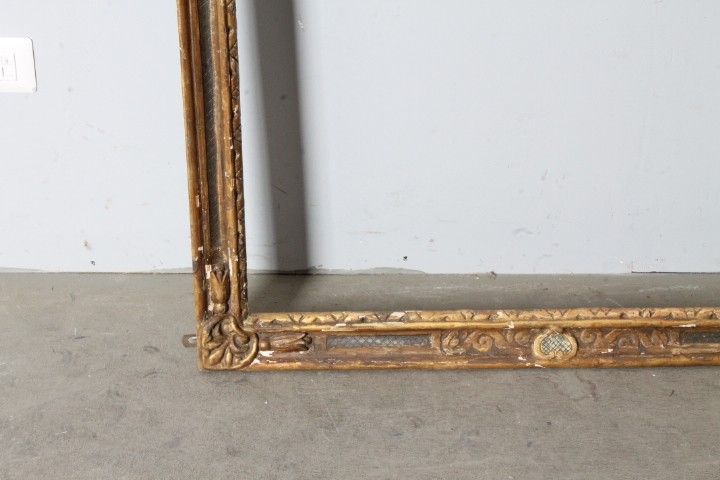 Antique large frame from the 1750s. Gilded and painted with carvings. Size 215 x 98