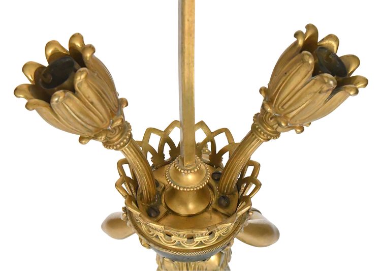 Empire style gilt bronze and marble lamp representing a caryatid