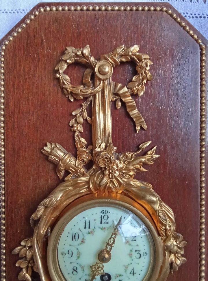 Antique small Louis XVI style cartel clock