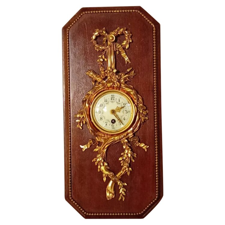 Antique small Louis XVI style cartel clock