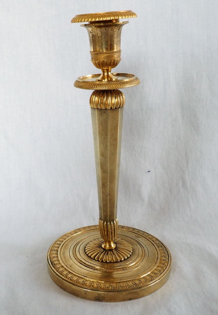 Ravrio: pair of Empire candlesticks in mercury-gilded bronze, early 19th century