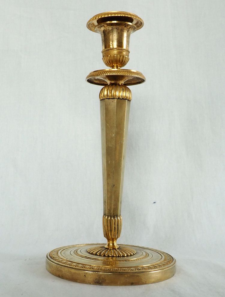 Ravrio: pair of Empire candlesticks in mercury-gilded bronze, early 19th century