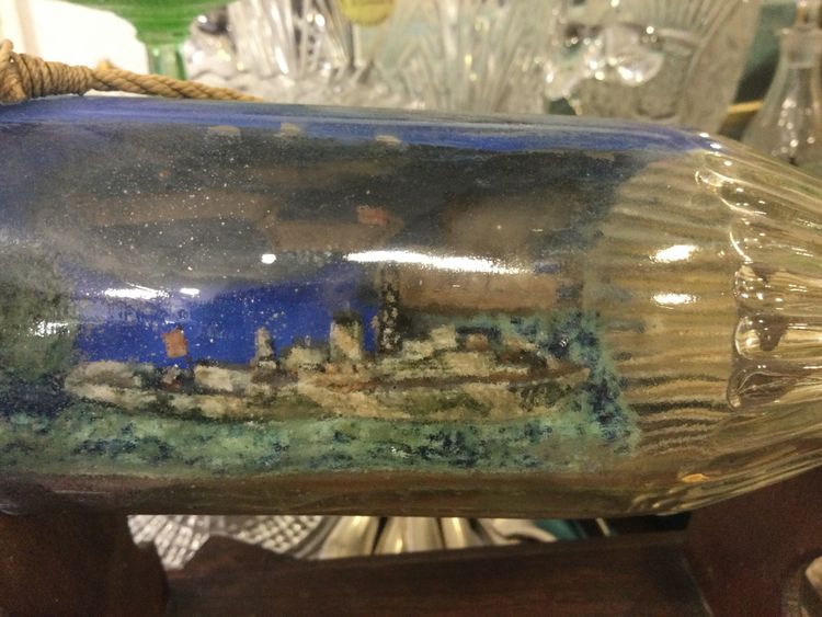 Military ship in a bottle