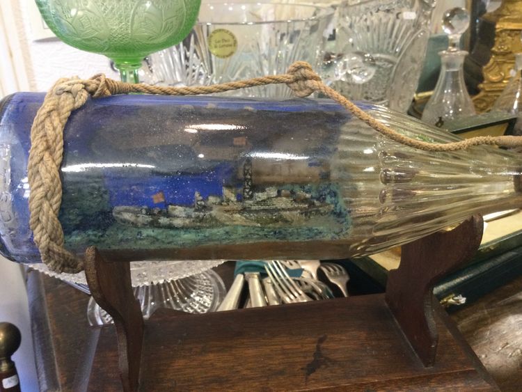 Military ship in a bottle