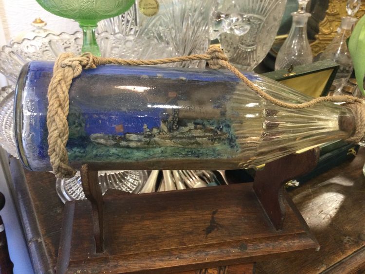 Military ship in a bottle