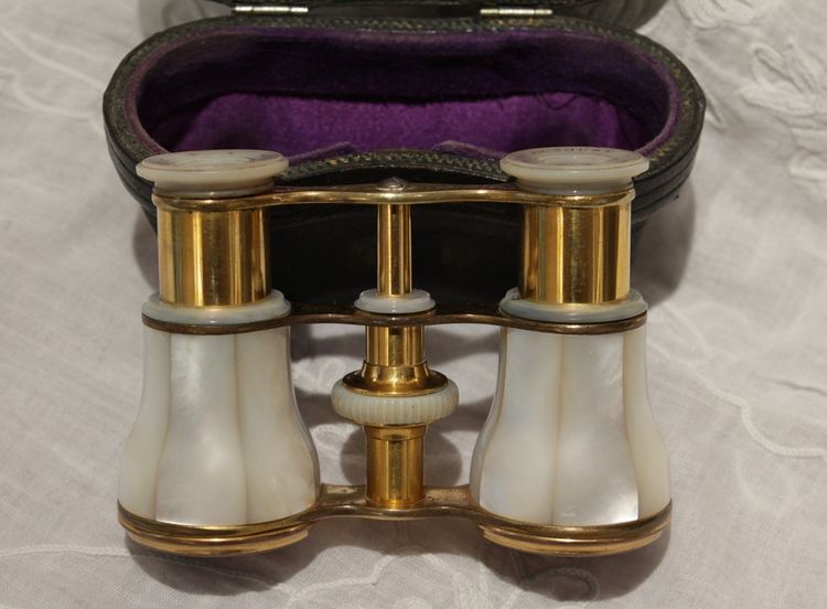 Pair of mother-of-pearl theatre binoculars with leather case, late 19th century