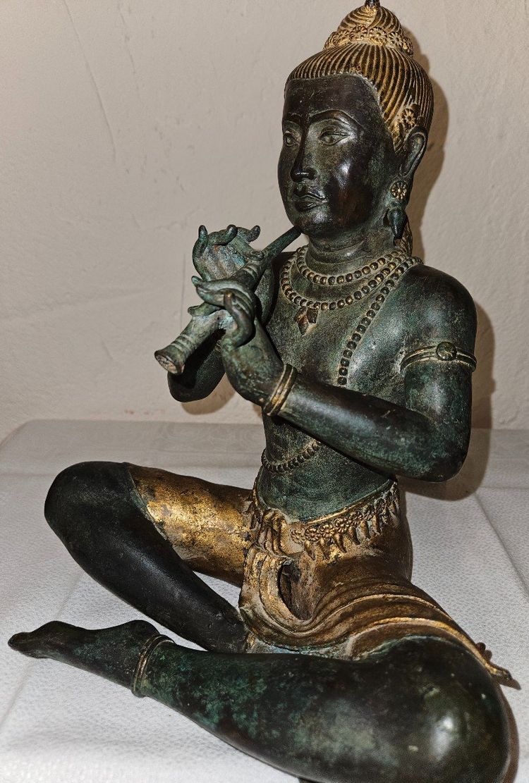 Statuette of Buddha playing the flute - Bronze - Early 20th century -