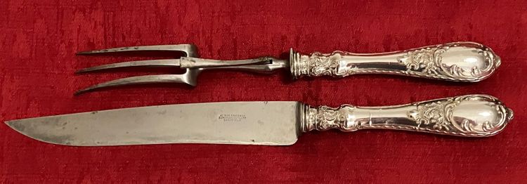 Louis XV style cutting set in English silver plated metal by the House of Scheffield