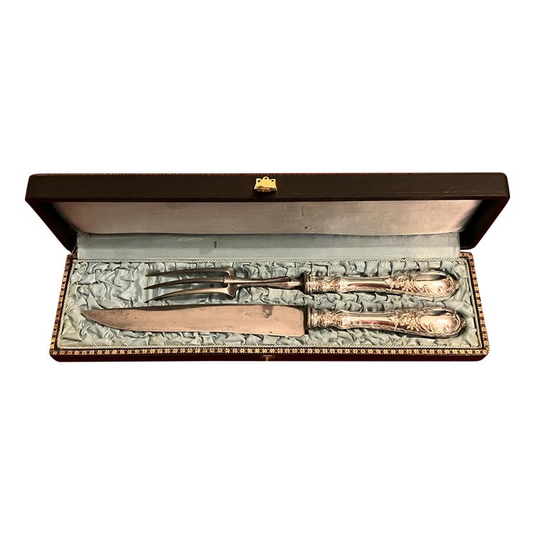 Louis XV style cutting set in English silver plated metal by the House of Scheffield