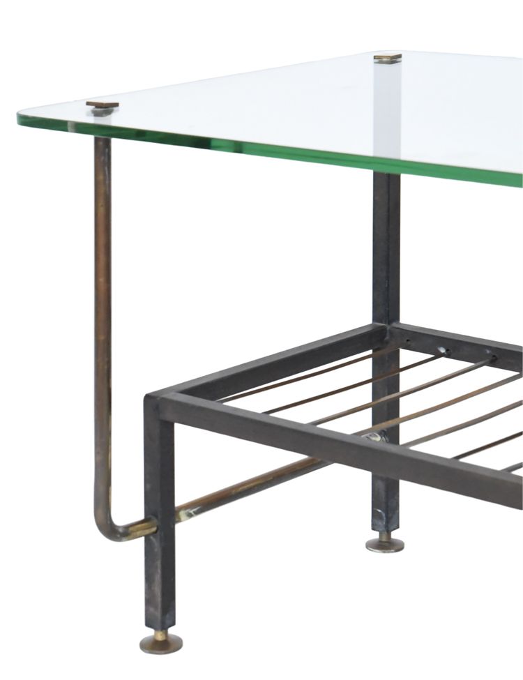 Metal coffee table with glass top in the style of Pierre Guariche