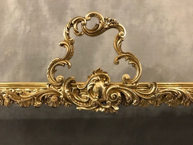 Brass and bronze fire screen from the 19th century