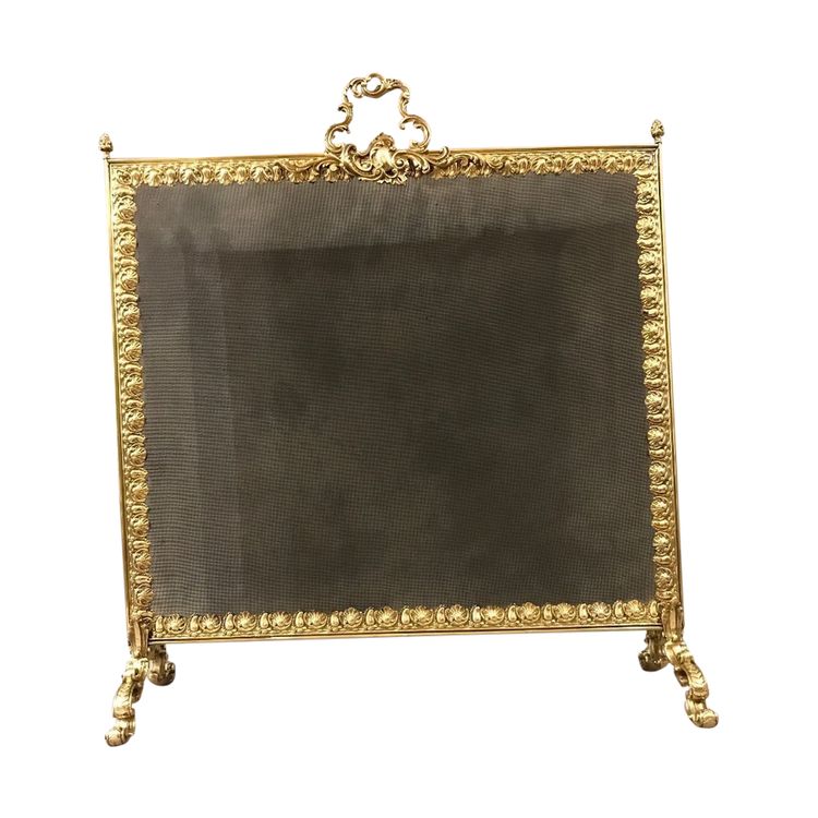 Brass and bronze fire screen from the 19th century