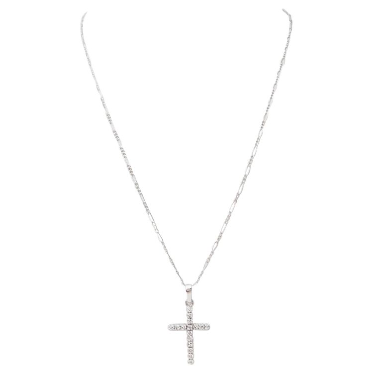 Collier pendentif croix en or blanc et diamants