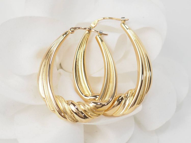 Twisted creole earrings in yellow gold